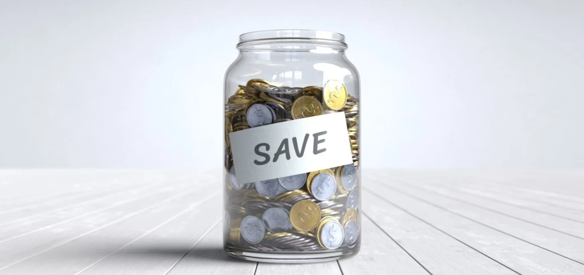 Jar full of coins representing a savings account and financial growth