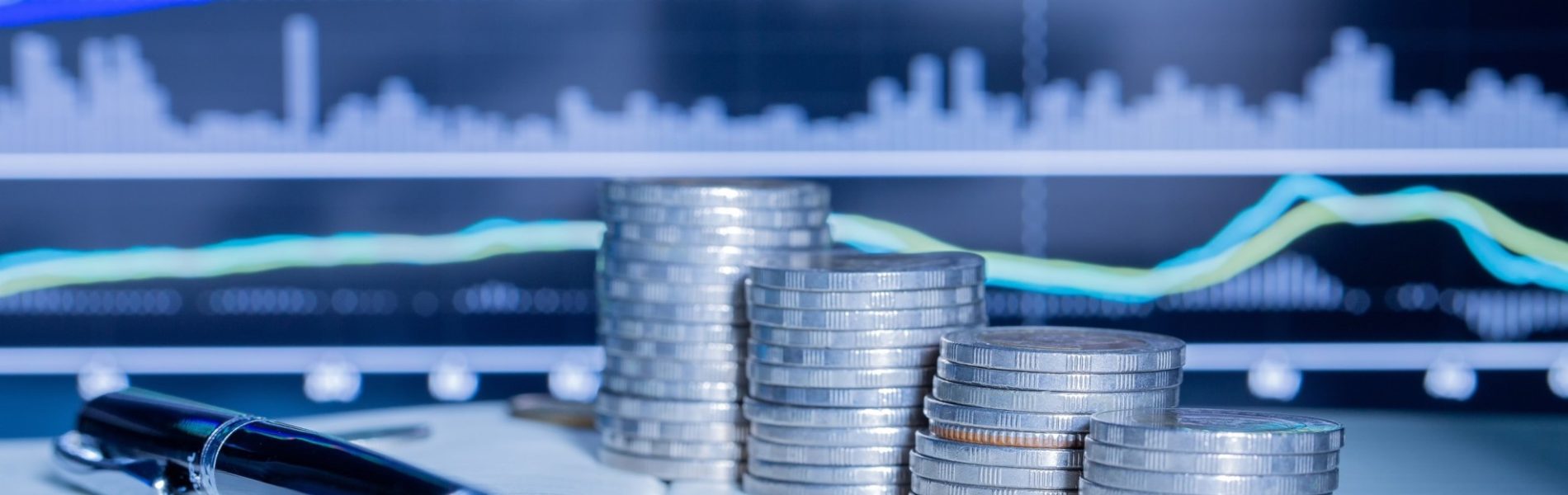 stack-money-coin-with-trading-graph