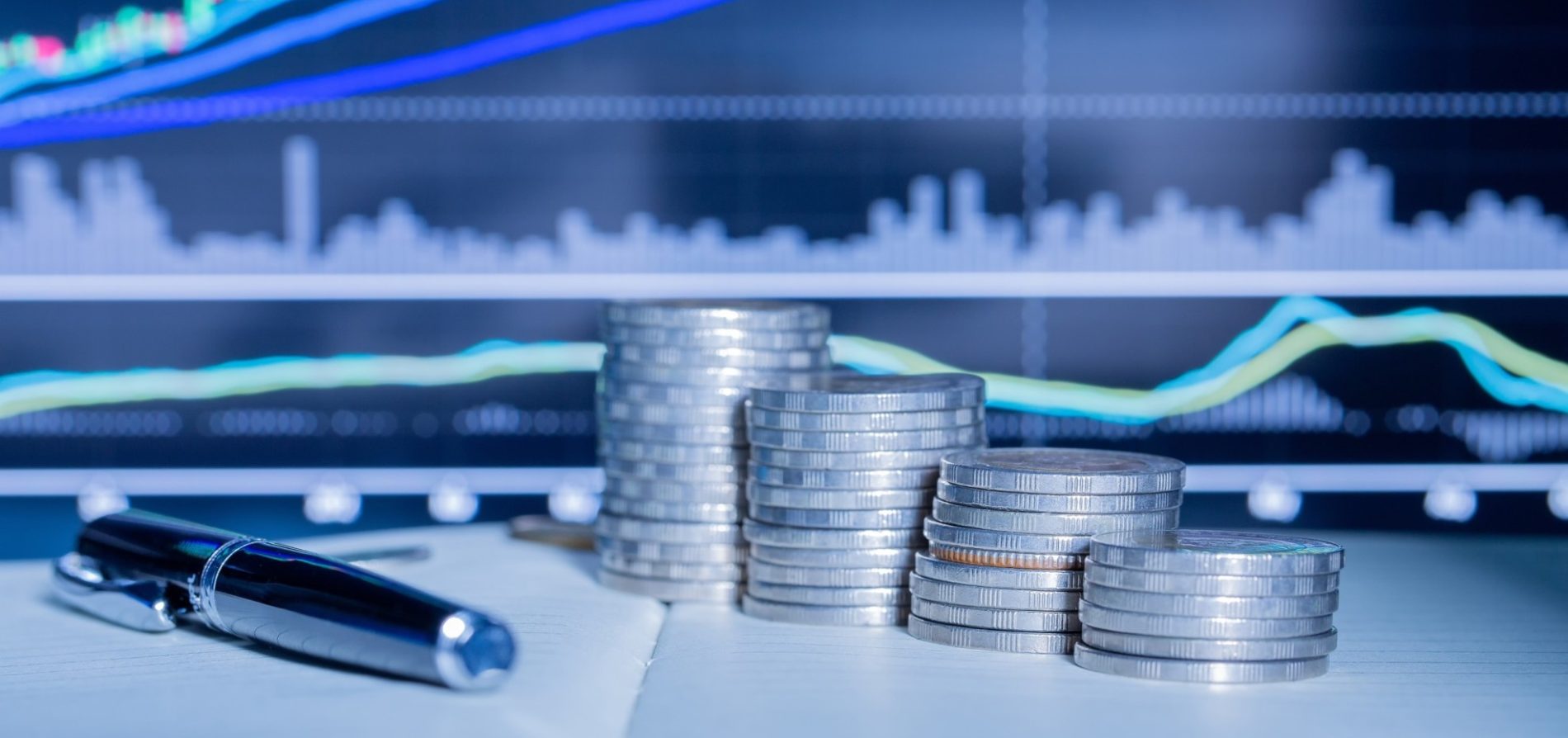 stack-money-coin-with-trading-graph